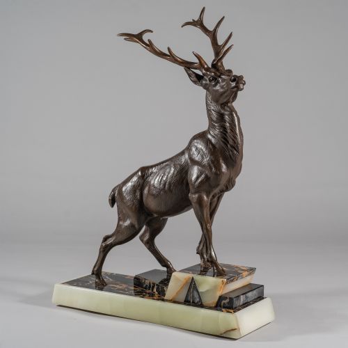 LARGE FRENCH ART DECO SCULPTURE OF A SPELTER STAG SET ON A MARBLE AND ONYX BASE - ADDITIONAL PHOTO 3