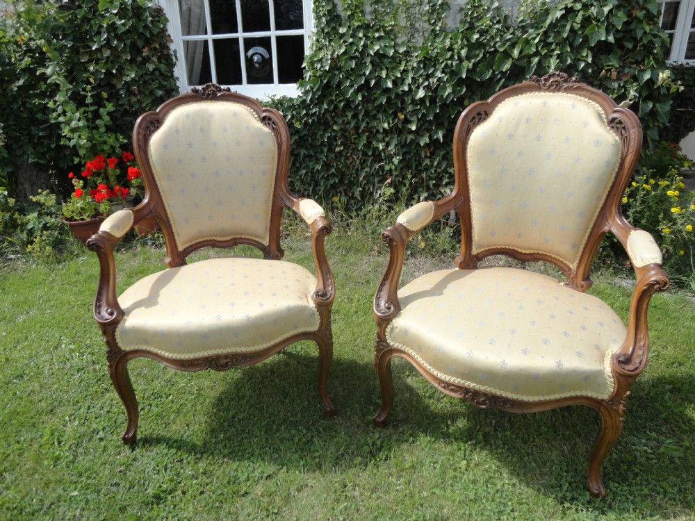 Pair of French Carved Walnut Armchairs
