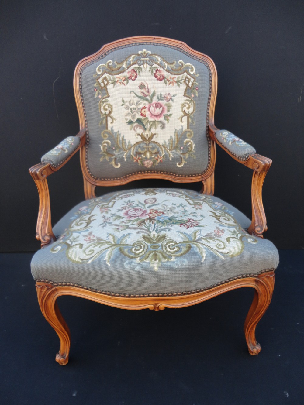 French Carved Walnut Armchair With Tapestry Upholstery 