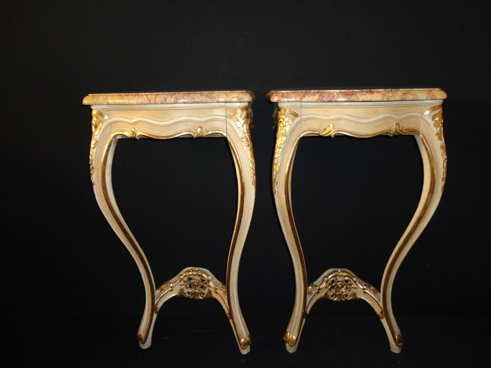 Pair Of French Painted And Gilt Console Tables.