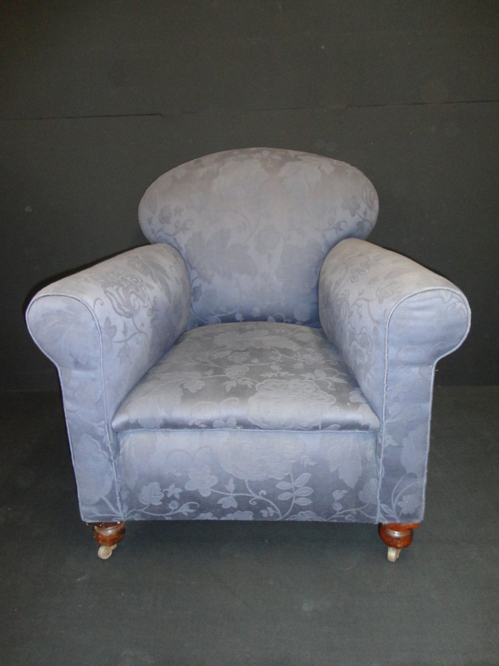 Victorian Mahogany Armchair set on its original casters