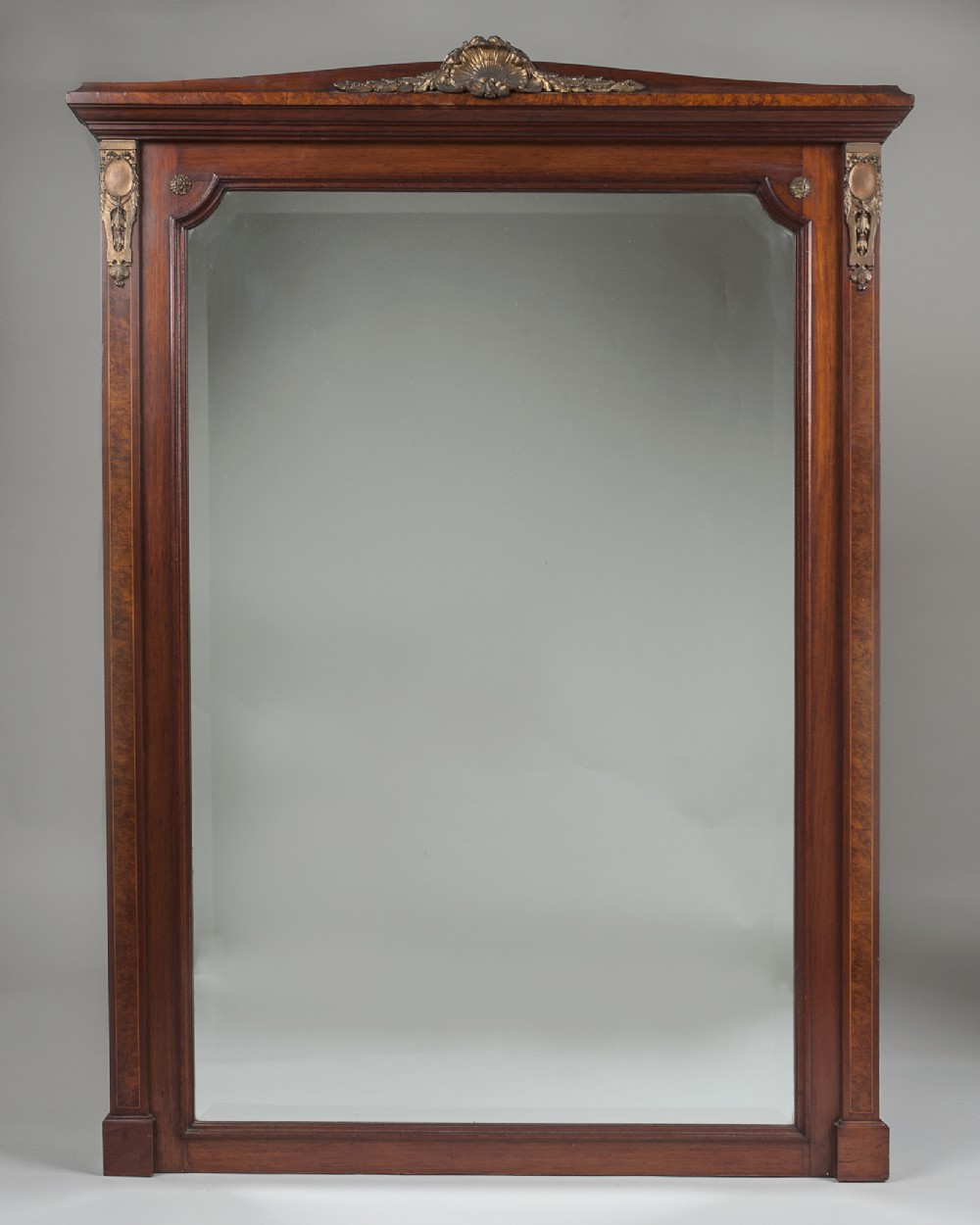 French Walnut veneered overmantle mirror with bronze ormolu mounts