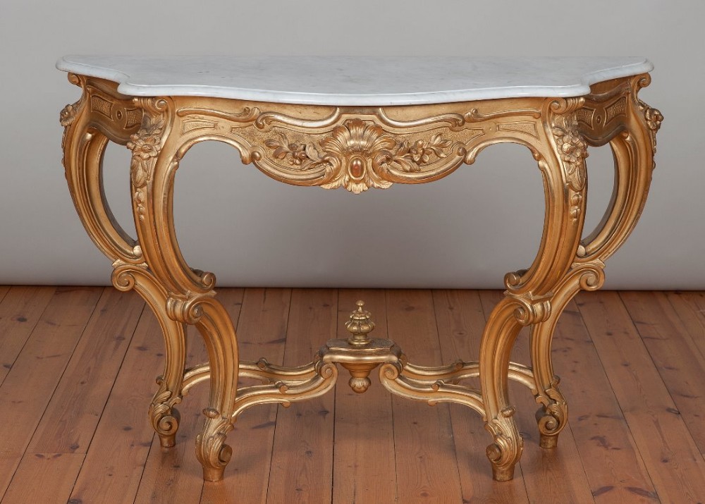 Fabulous French gilt console table with a white Carrera marble top