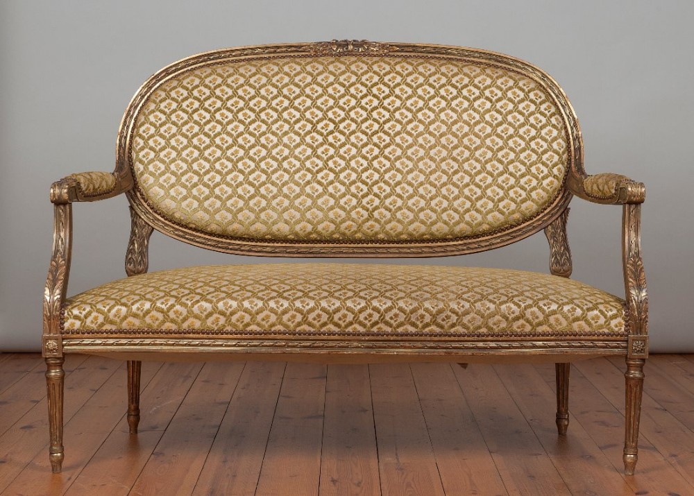 Late 19th Century French Louis XV1 carved wood and gilt upholstered sofa
