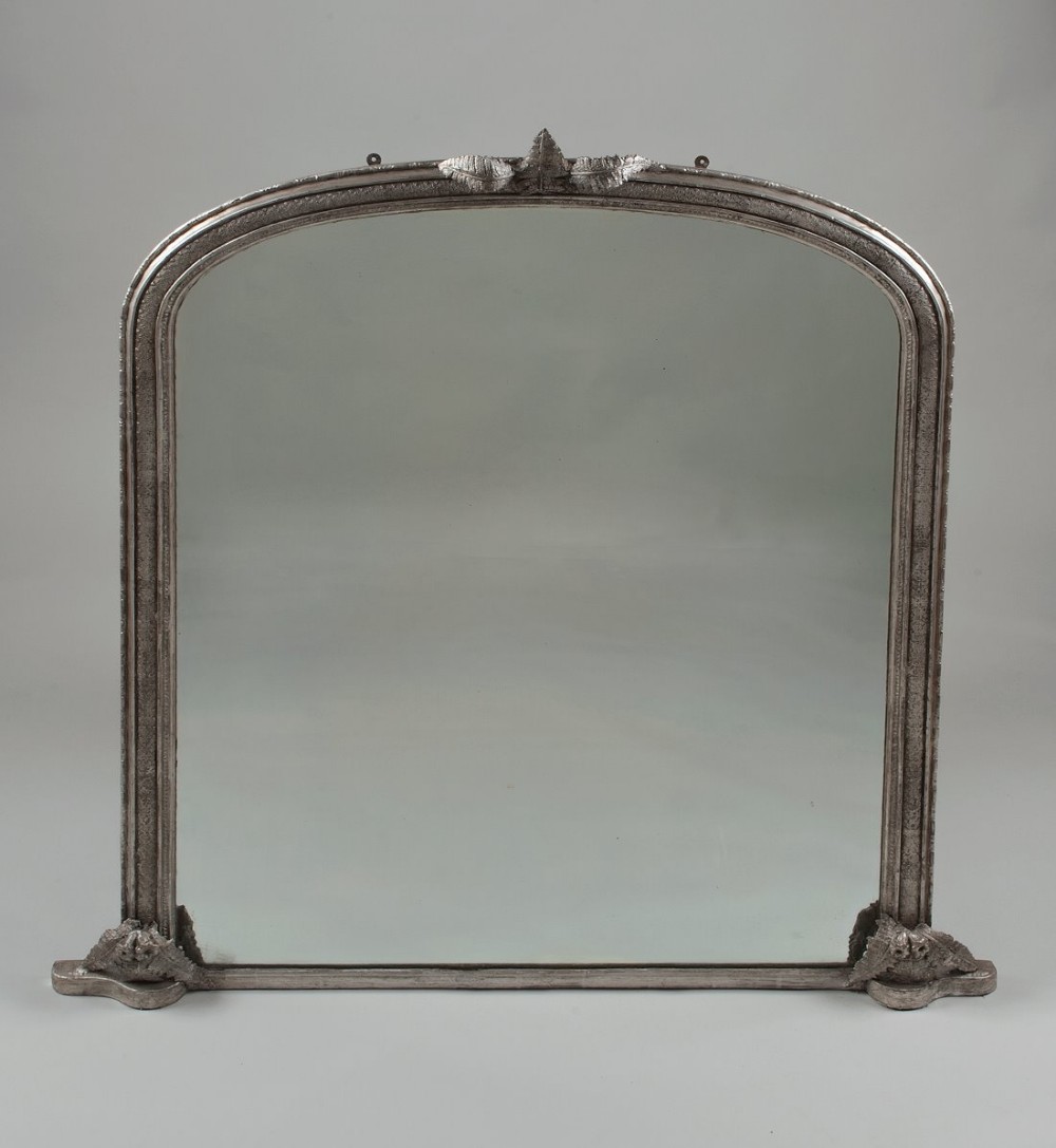 Late 19th century large English silvered overmantle mirror