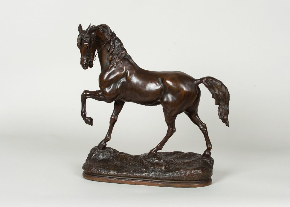 French sculpture of a spelter horse with bronzed patination , signed C.H.Valton