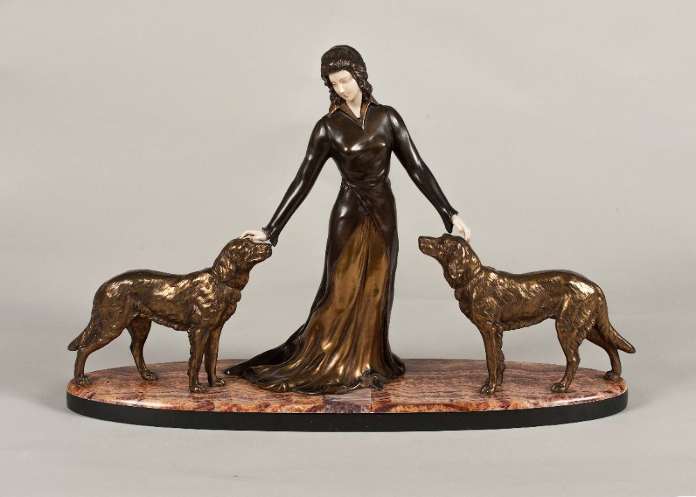 French Art Deco spelter and Ivorine sculpture set on a marble base