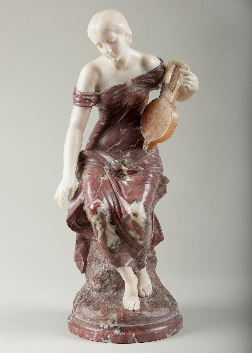 Stunning Italian marble sculpture of a female playing a lyre. Signed Pugi