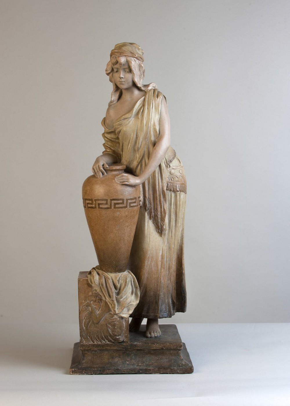 French terracotta sculpture of a female water carrier.