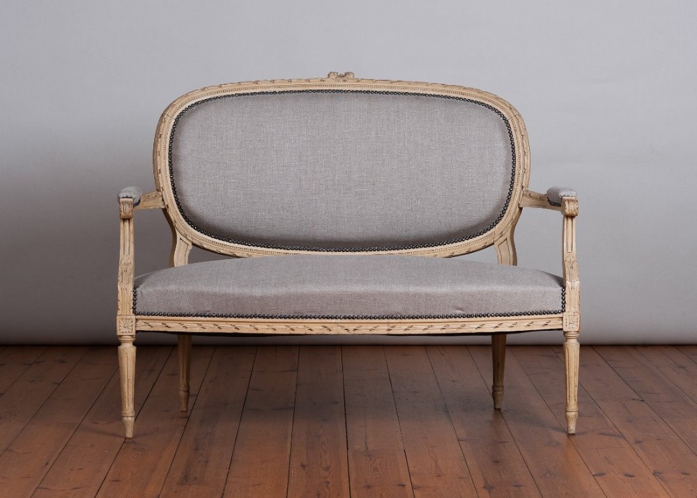 Late 19th Century French original painted salon sofa, upholstered in a grey fabric