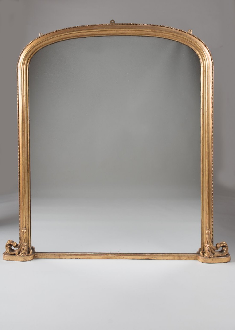 Late 19th Century large English gilt overmantle mirror