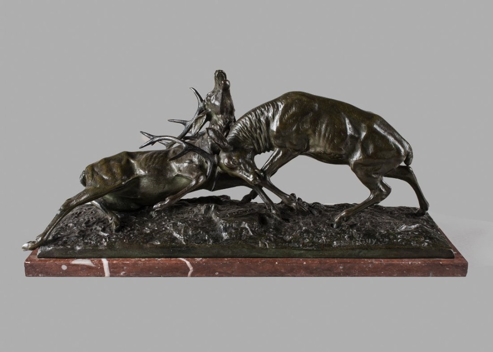 French Bronze Sculpture Of A Pair Of Fighting Stags Set On A Marble Base. Signed E.GUY