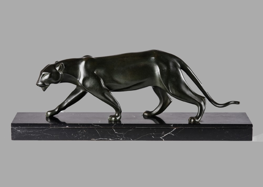 Stunning French Art Deco Bronze Sculpture Of A Panther set on a marble base.