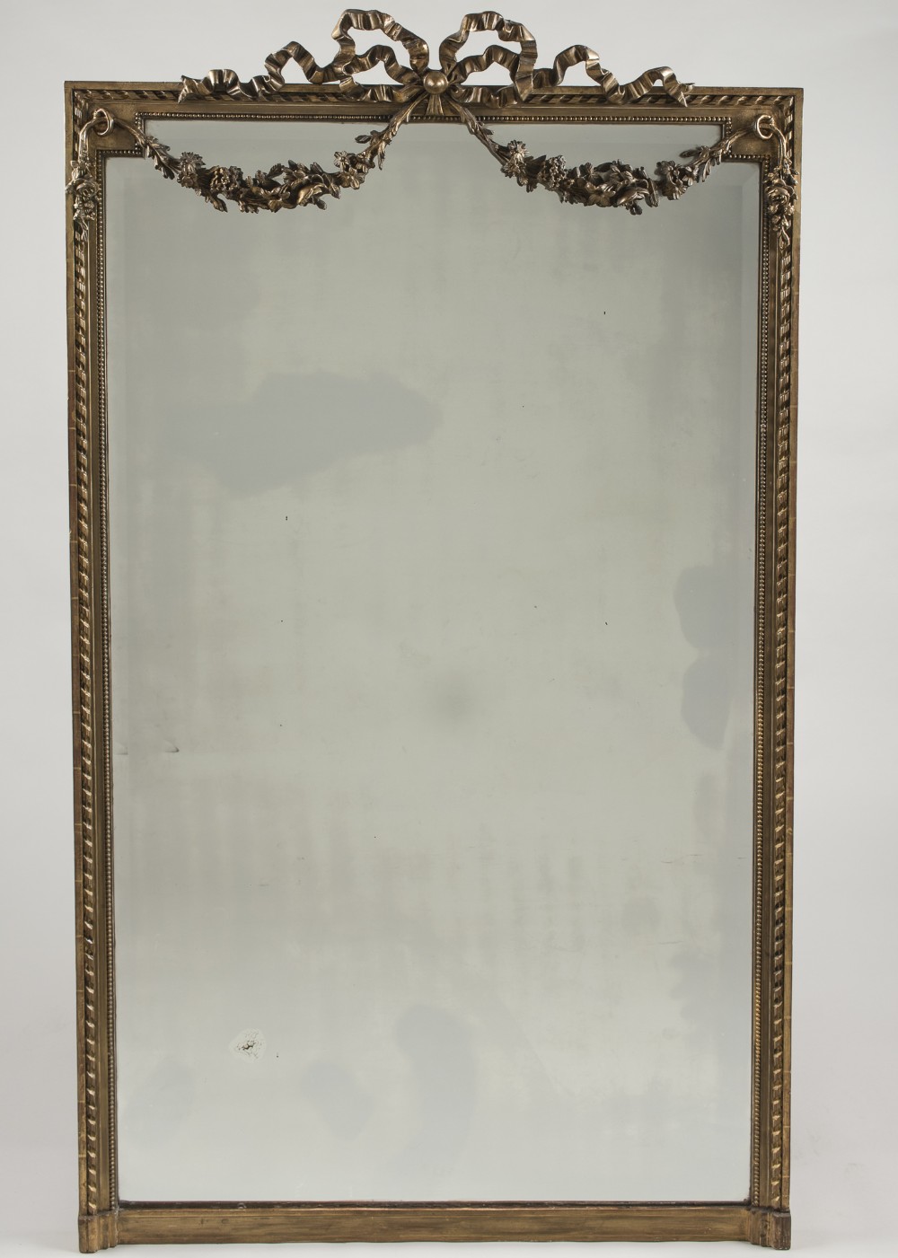 Large 19th Century French Gilt Overmantle Mirror with ribbon and flower decoration And Bevelled Glass.