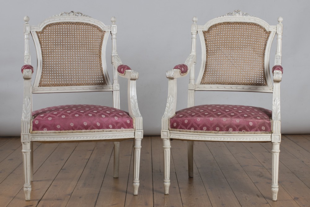 Pair Of French Painted And Cane Salon Armchairs