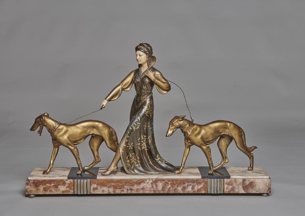 Large French Art Deco Spelter And Ivorine Sculpture Of A Lady Walking Her Dogs