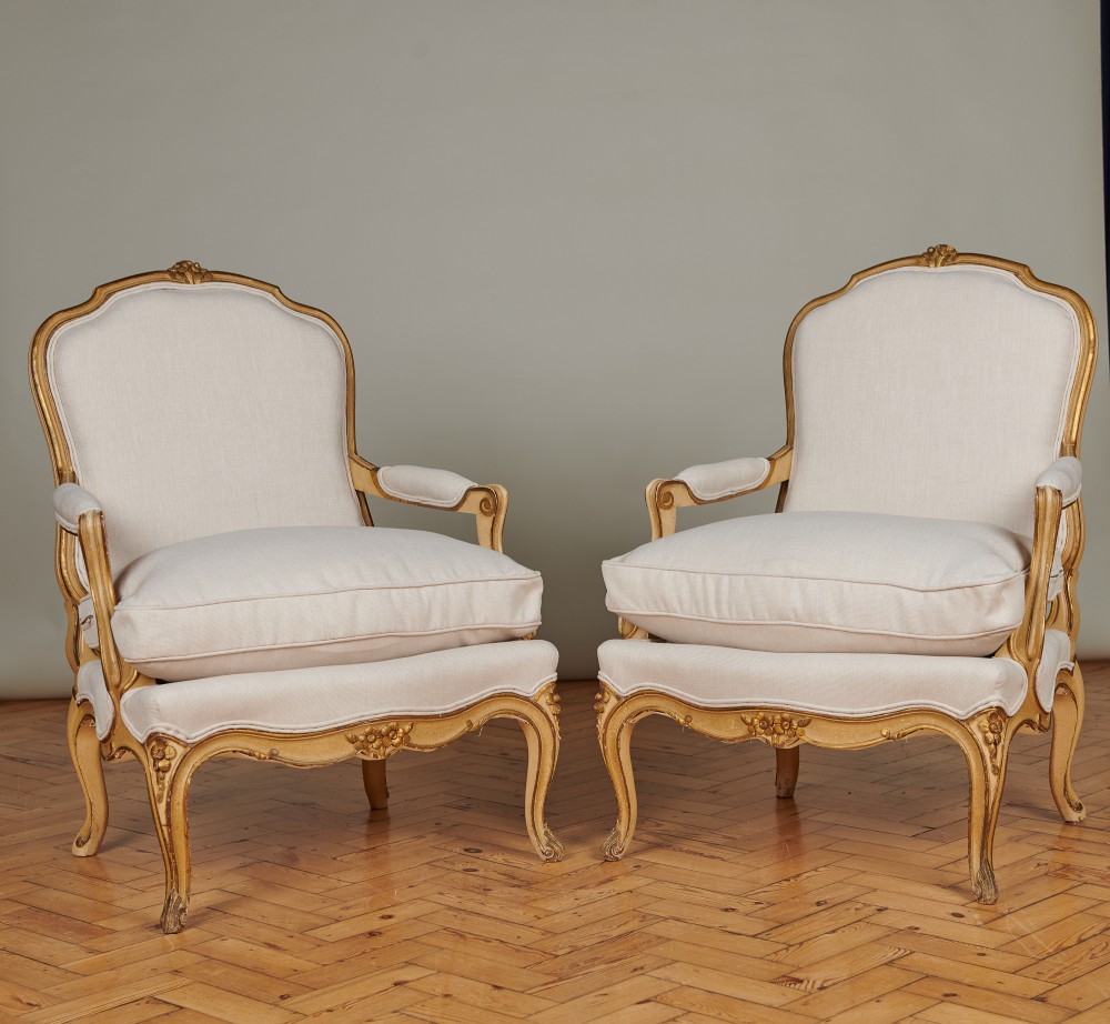 A Pair Of Large French Louis XV Style Gilt And Painted Upholstered Bergere Armchairs.