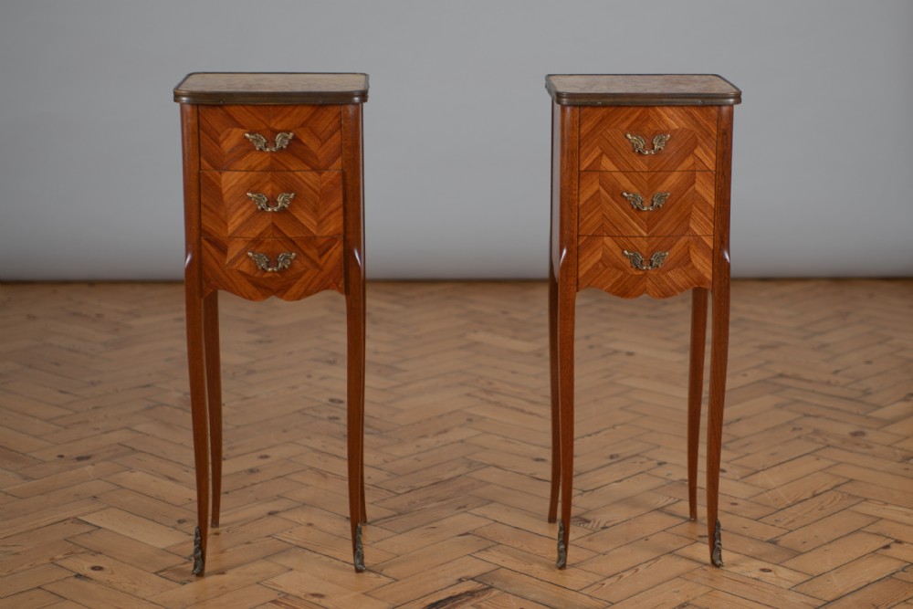 A Pair Of French Three Drawer Walnut Inlay Bedside Cabinets