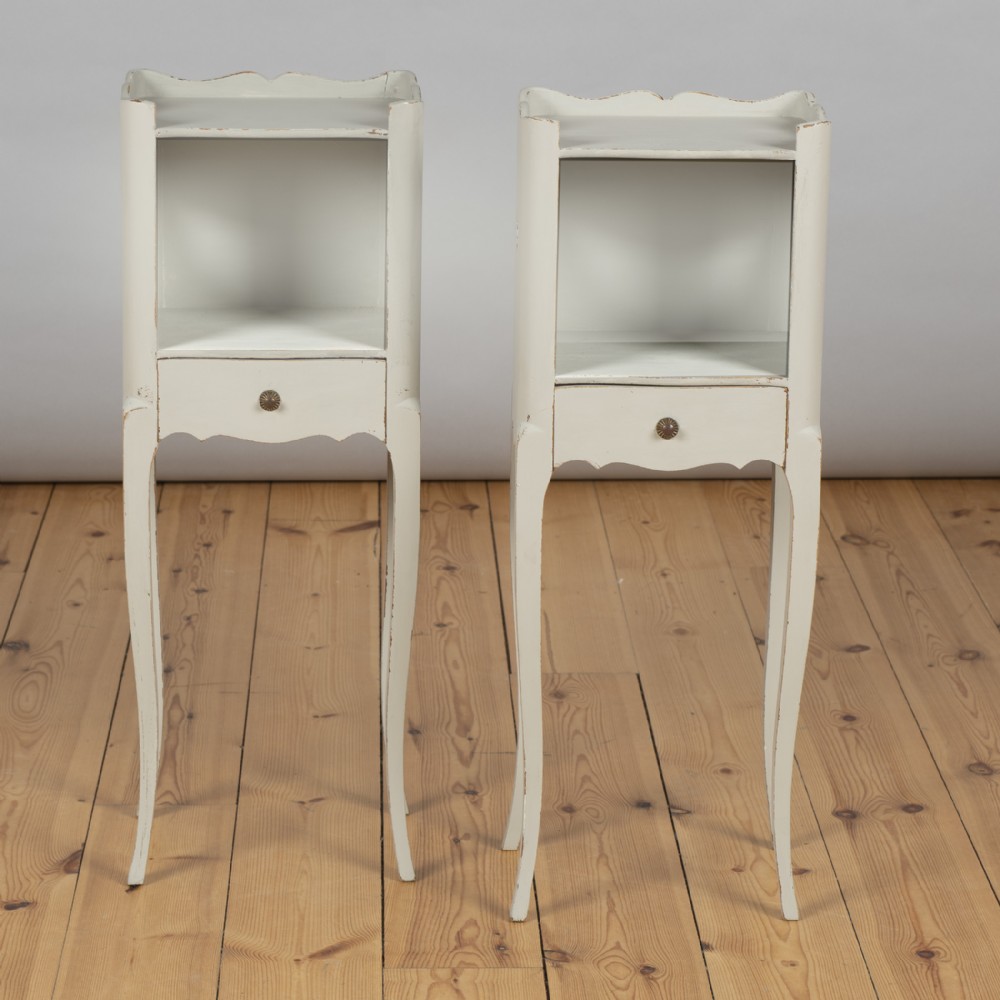 A Pair Of French Painted Bedside Cabinets With A Single Drawer