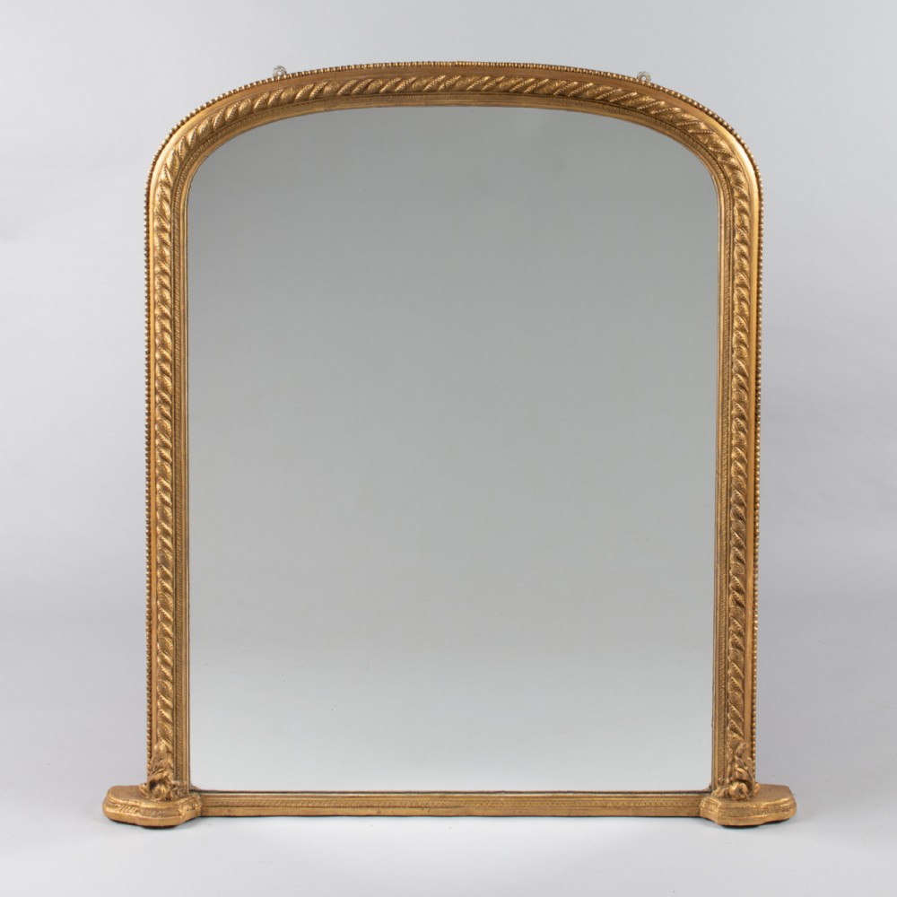 A large Victorian English Gilt Overmantle Mirror