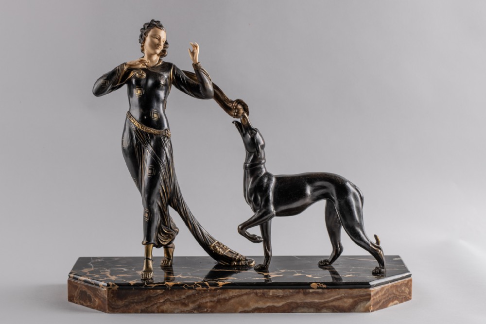 A Stunning French Art deco Spelter And Ivorine Sculpture By Menneville And Rochard