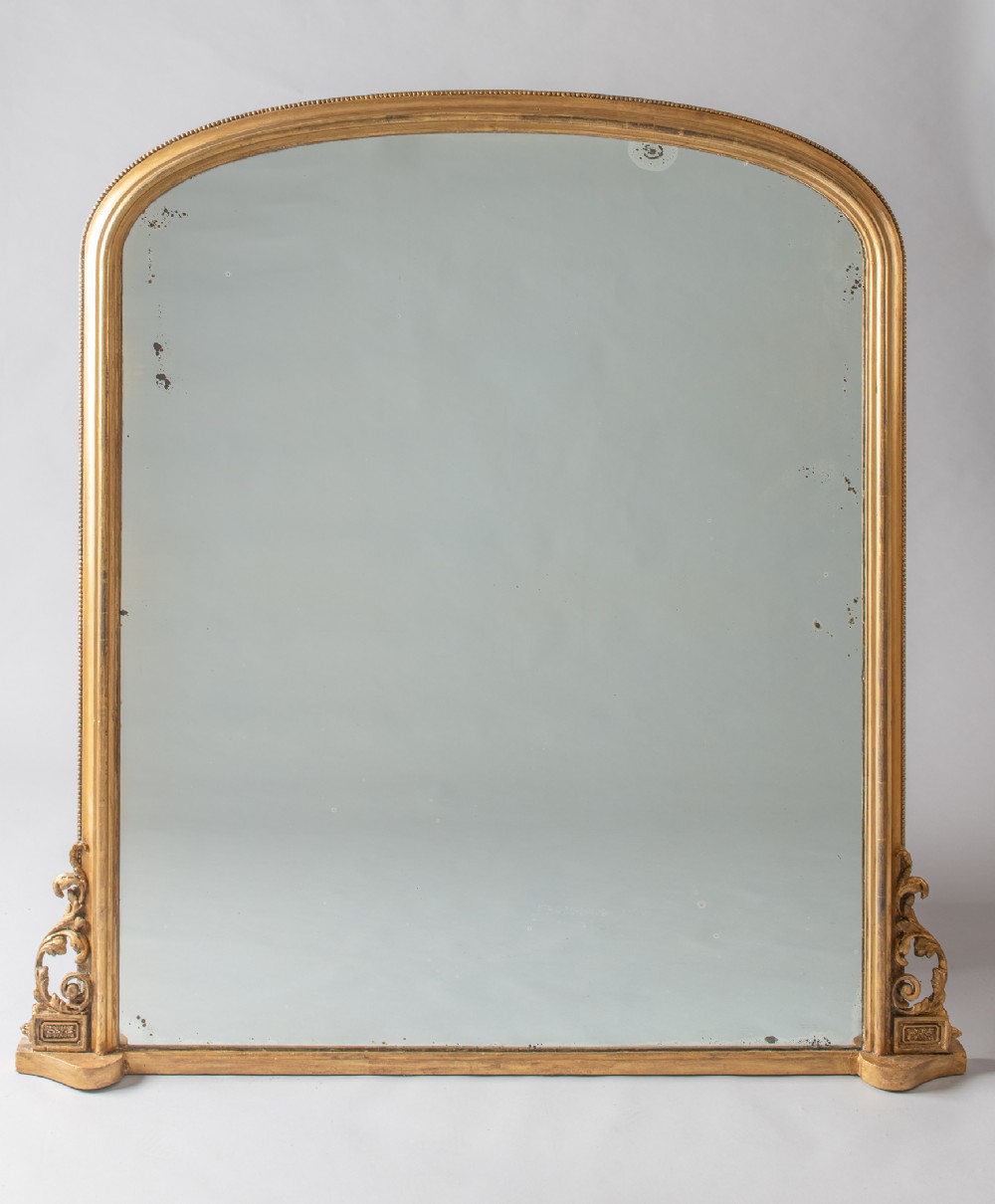 A Large English Victorian Gilt Archtop Overmantle Mirror
