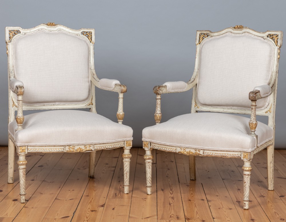 Pair Of 19th Century French Painted And Parcel - Gilt Upholstered Armchairs