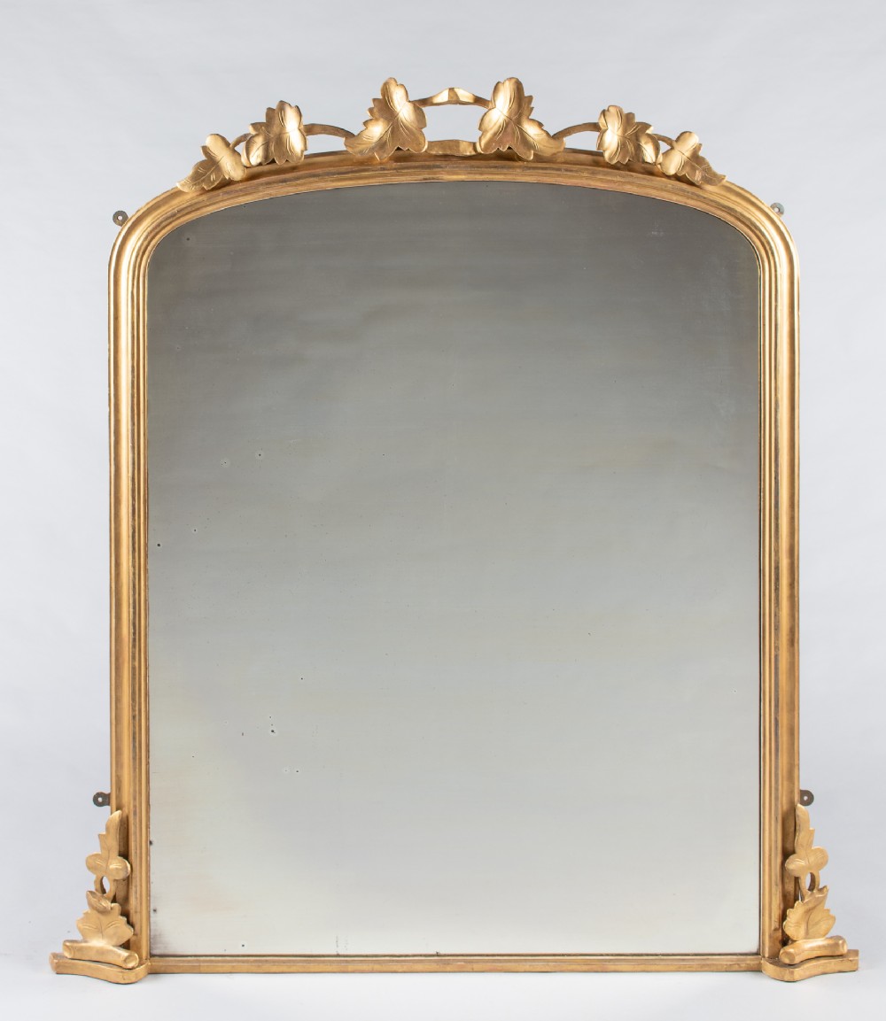 A Large English Victorian Carved Giltwood Overmantle Mirror