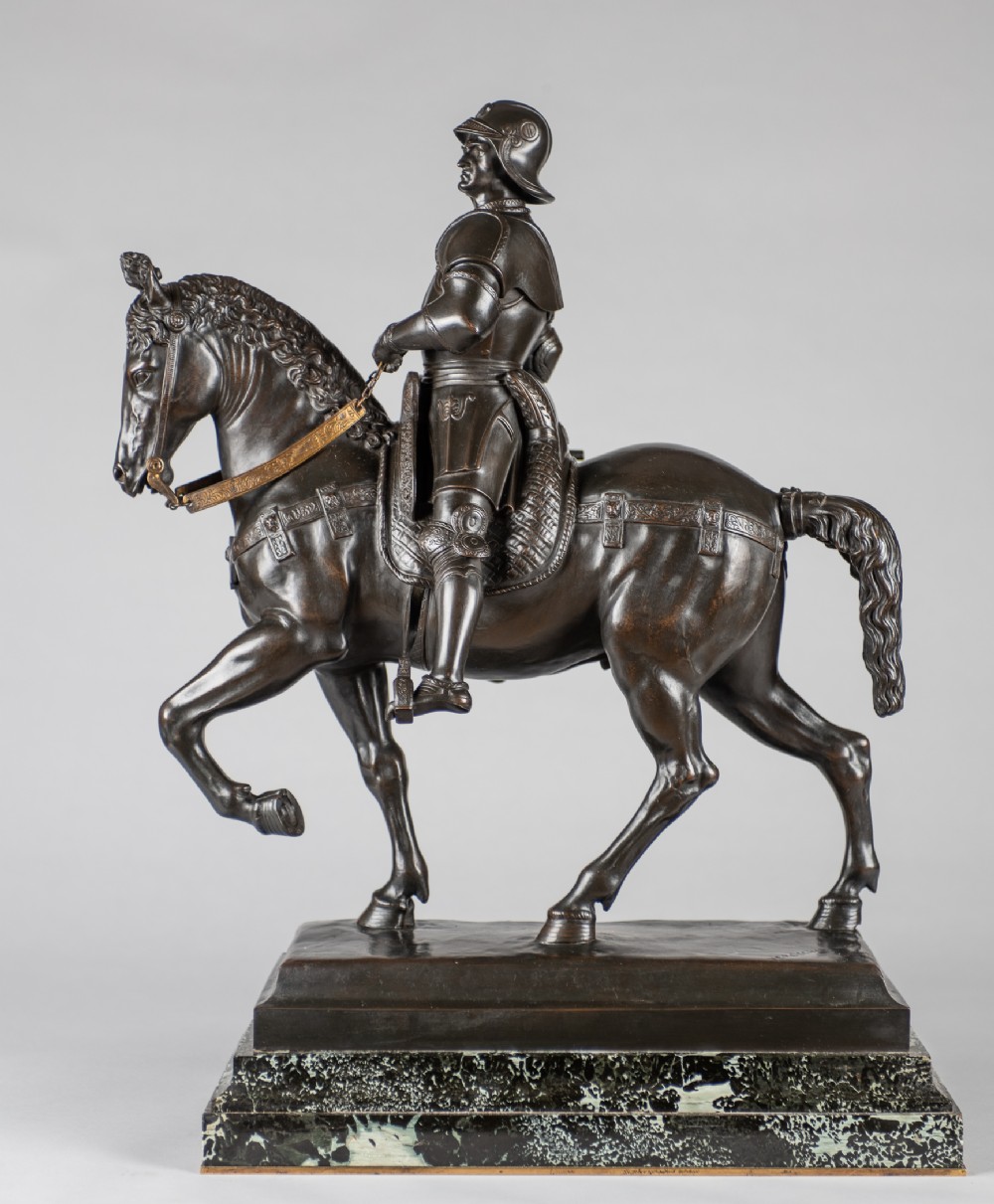A 19th-century dark patinated bronze equestrian sculpture of the armoured condottiero Bartolomeo Colleoni mounted on horseback atop a green marble plinth.