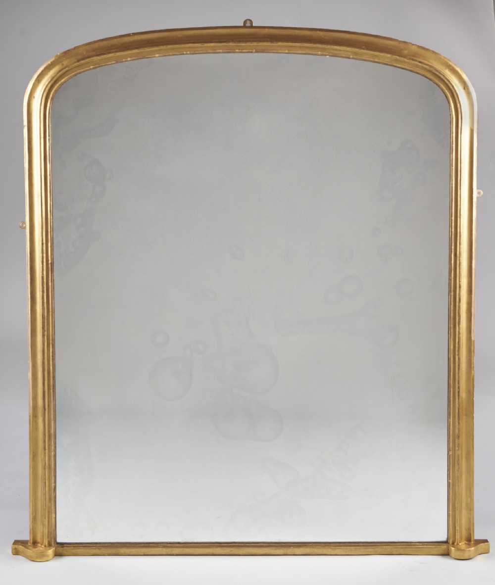 A Large English Victorian Gilt Archtop Overmantle Mirror