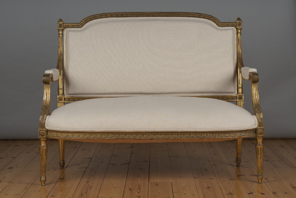 A Large 19th Century French Louis XV1 Style Gilt Upholstered Sofa.