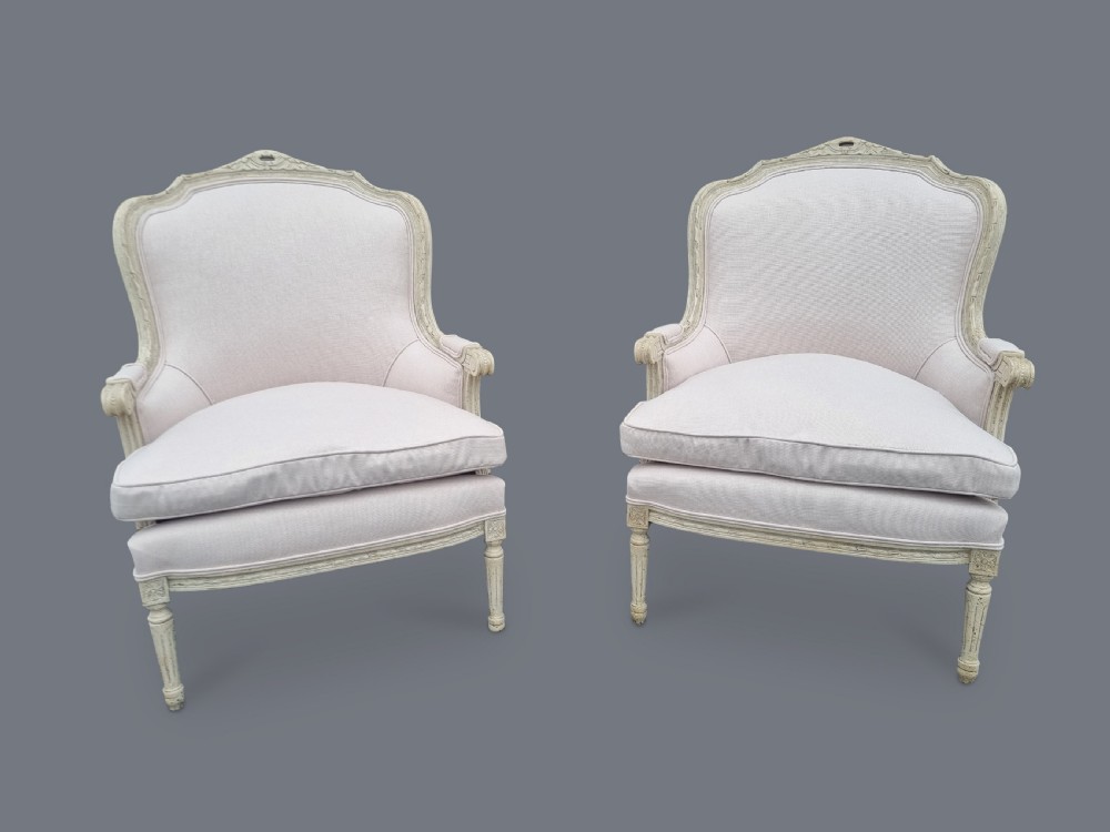 Pair Of Large French Painted Louis XV Style Carved Bergere Upholstered Armchairs