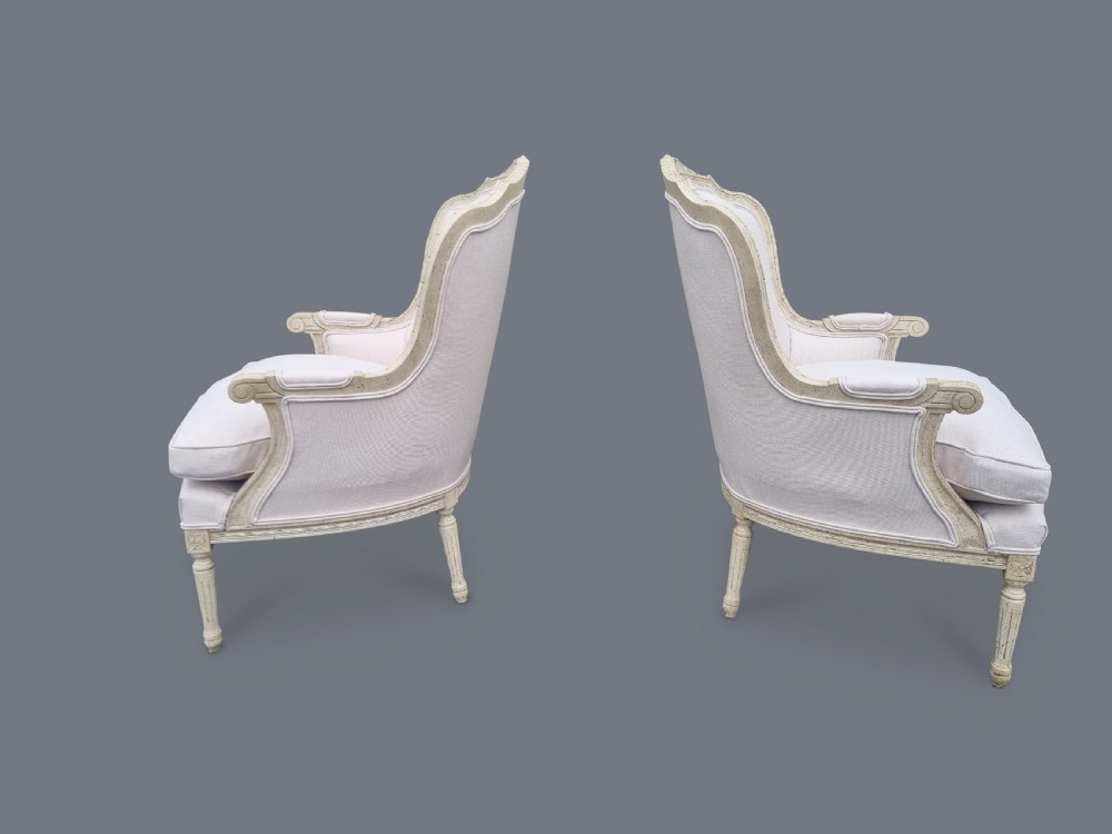 Pair Of Large French Painted Louis XV Style Carved Bergere Upholstered Armchairs View II
