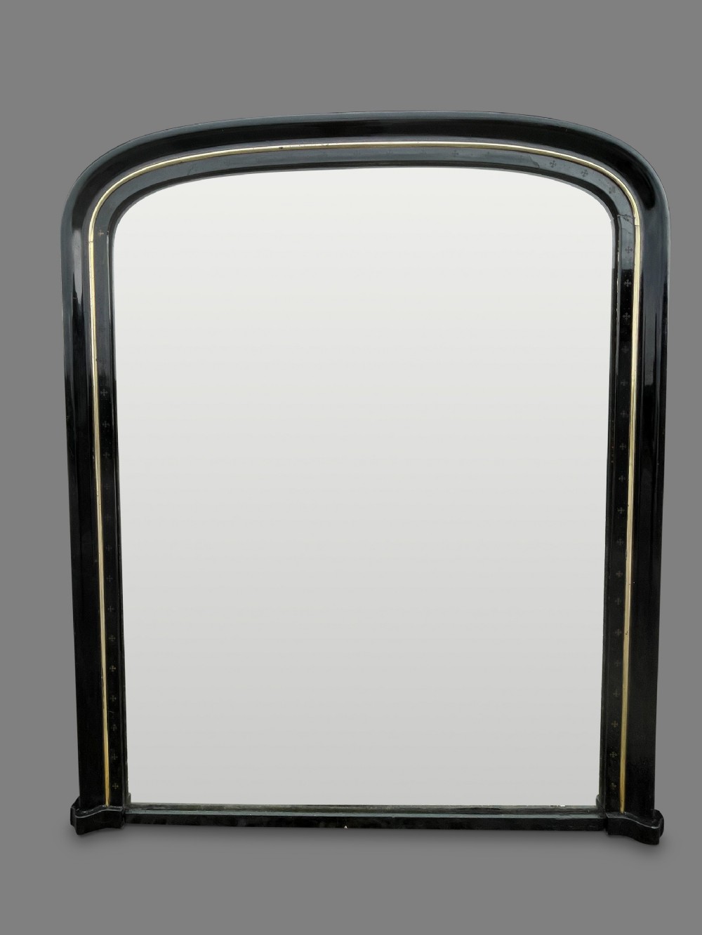 Large 19th Century Ebonised and parcel- gilt overmantle mirror