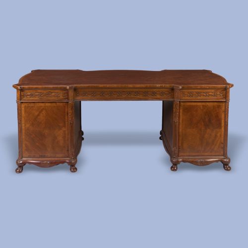 A MAHOGANY SERPENTINE FRONTED DESK - ADDITIONAL PHOTO 1