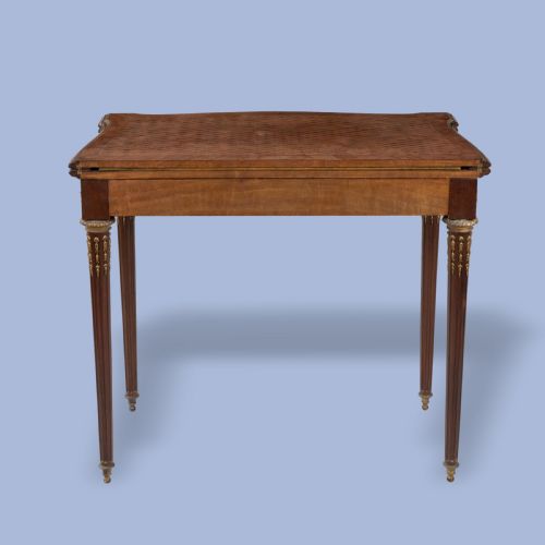 AN ORMOLUMOUNTED PARQUETRY CARD TABLE IN THE LOUIS XVI STYLE - ADDITIONAL PHOTO 2