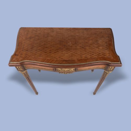 AN ORMOLUMOUNTED PARQUETRY CARD TABLE IN THE LOUIS XVI STYLE - ADDITIONAL PHOTO 6