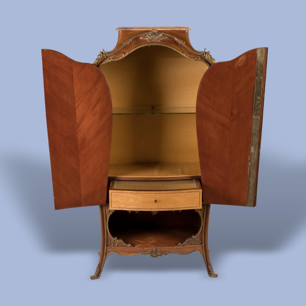 A LATE 19TH CENTURY ORMOLU-MOUNTED BOMBÉ CABINET View III