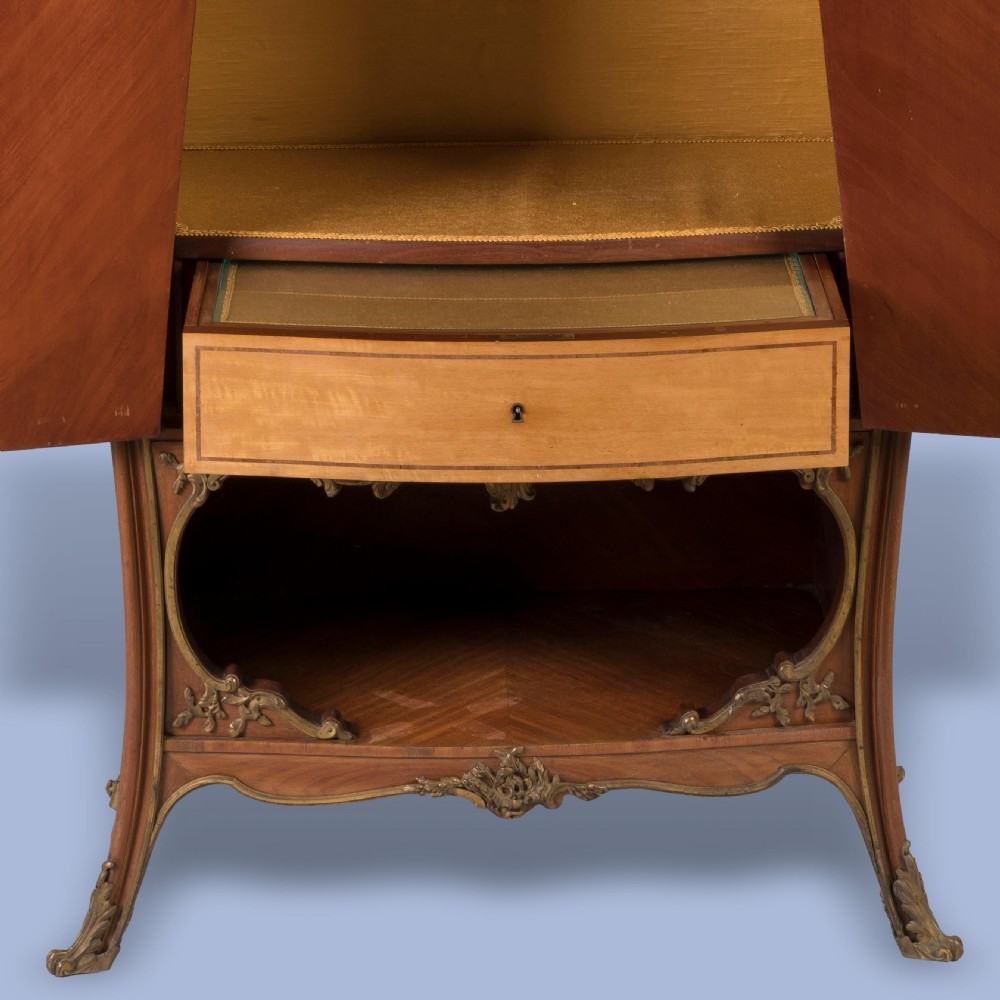 A LATE 19TH CENTURY ORMOLU-MOUNTED BOMBÉ CABINET View V