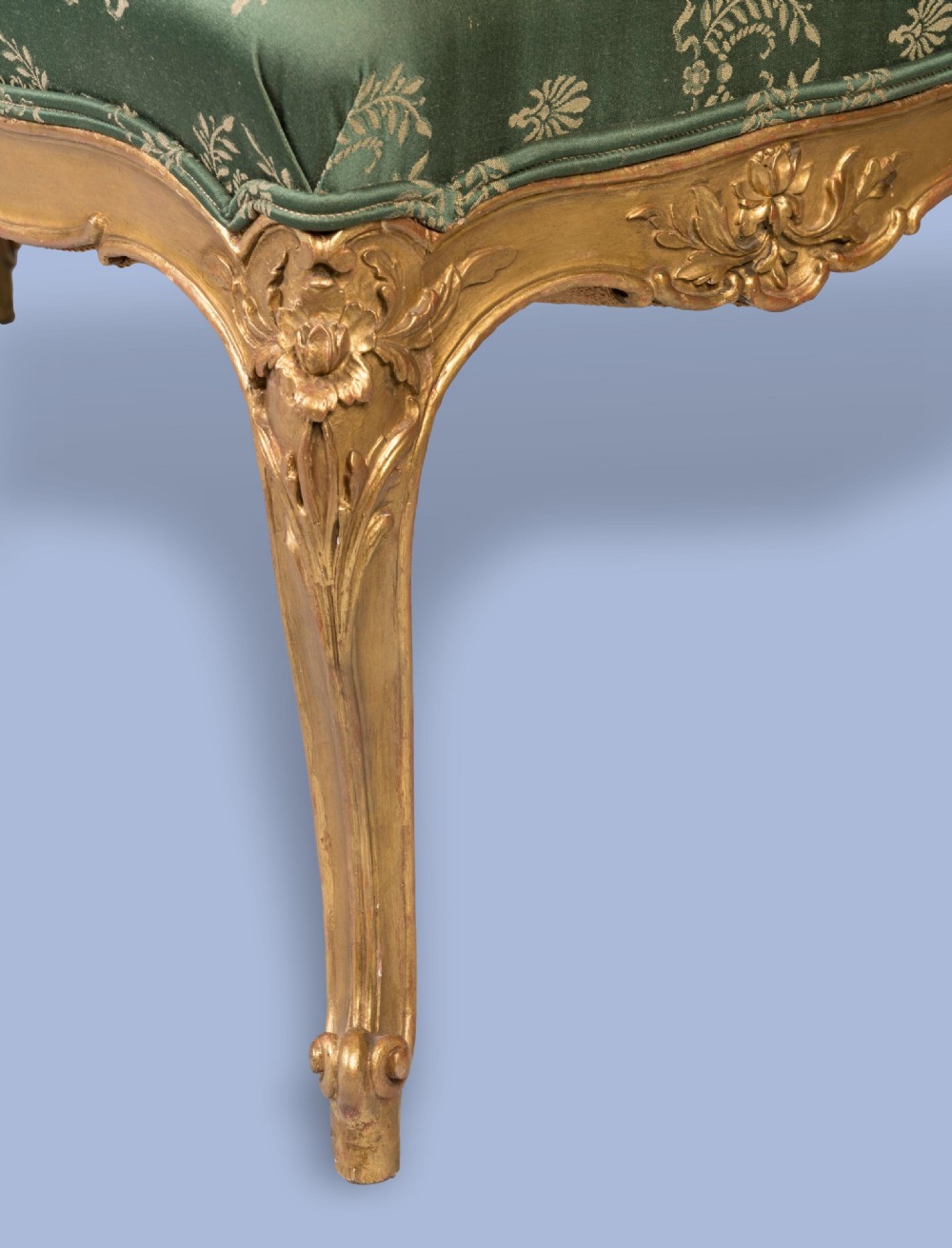 A FINE PAIR OF GILTWOOD FOOTSTOOLS IN THE LOUIS XV MANNER View IV