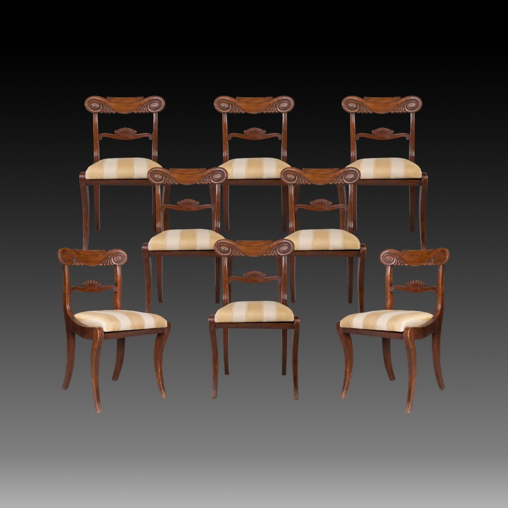 A SET OF 8 MAHOGANY CARVED DINING CHAIRS OF THE WILLIAM IV PERIOD