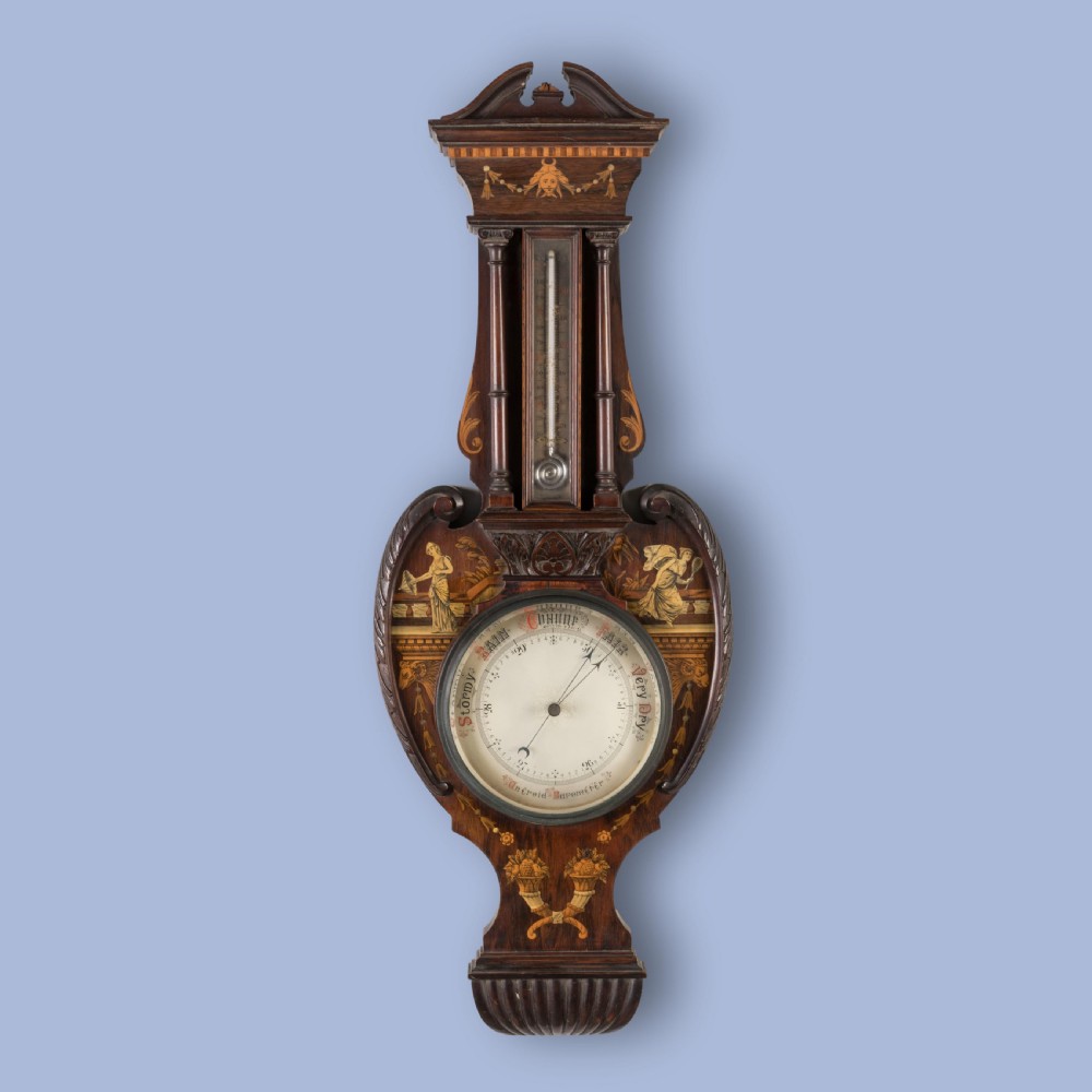 A wall-mounted Neo-Classical mahogany barometer featuring detailed marquetry inlay of classical figures, an upper thermometer tube, and a central circular dial.