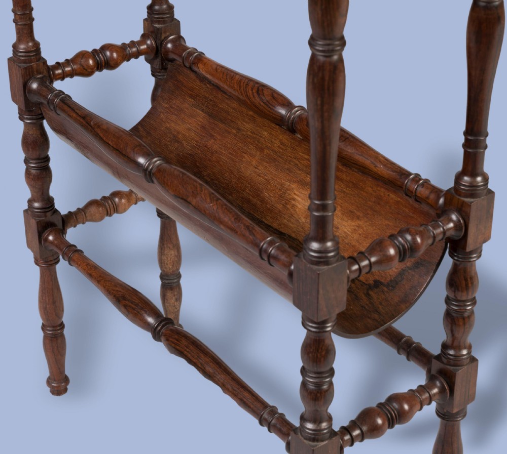 A set of four graduating brown rosewood quartetto tables featuring spindled legs and an inlaid chessboard top nested together. View III