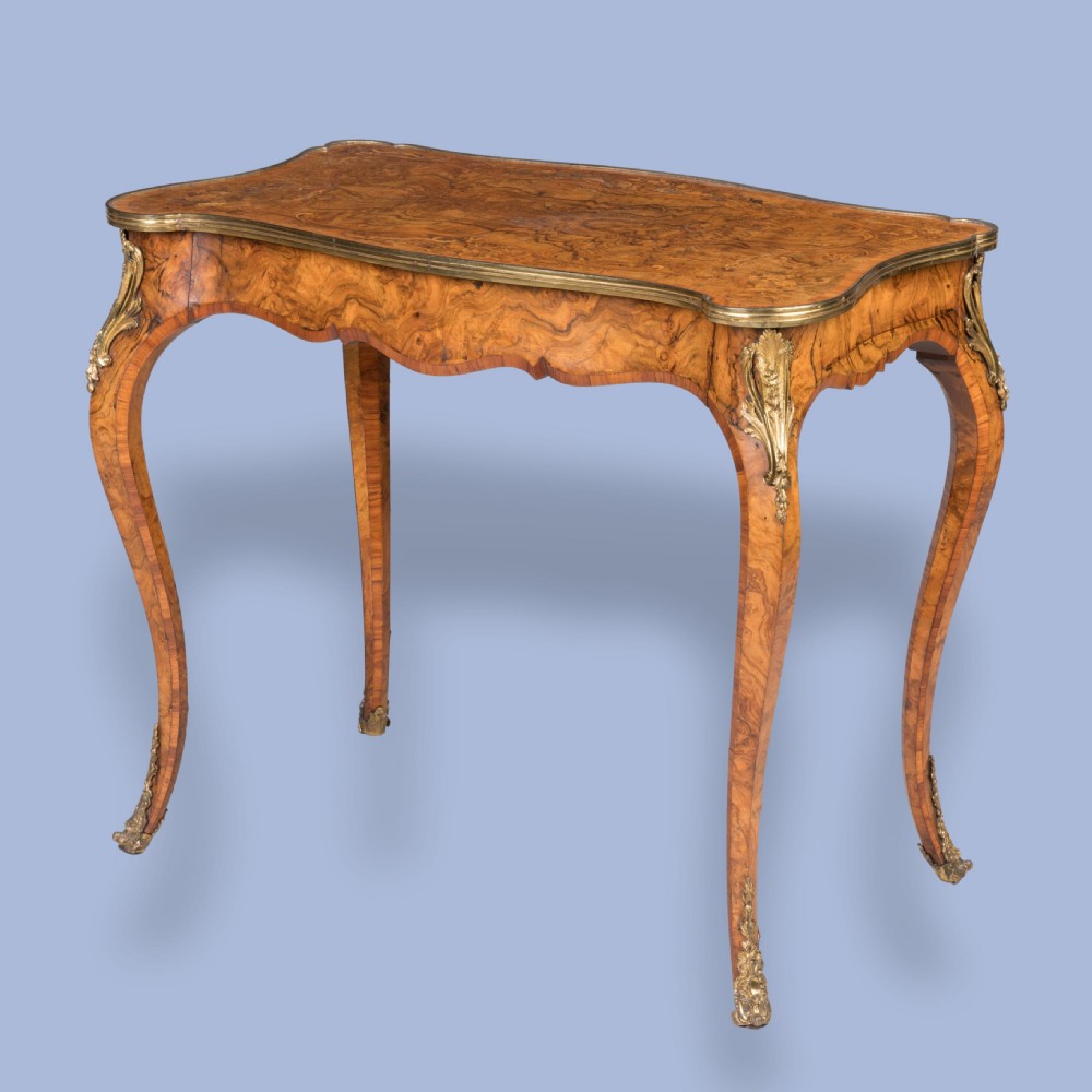 A Marquetry and Burr Walnut Side Table In the Louis XV Style By Gillows