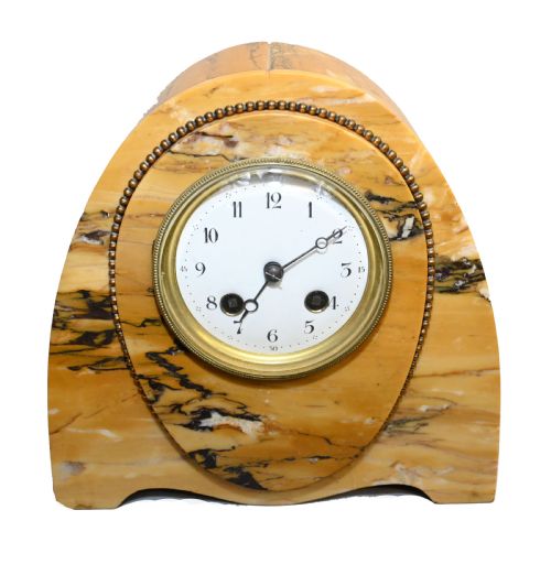 fig 1. An antique French three-piece garniture set featuring an arched yellow veined marble clock flanked by two matching marble pedestal tazzas.
