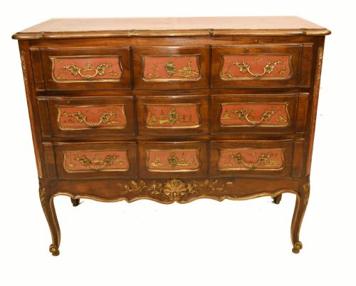 fig 1. Late nineteenth-century Chinoiserie commode featuring three drawers with terracotta lacquered panels, gilded scenes, and curved cabriole legs.