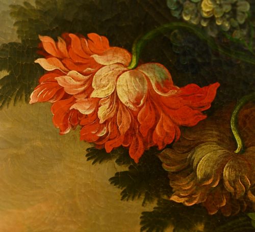 fig 1. An antique oil painting depicting an elaborate arrangement of colourful flowers in a classical urn, set within a wide gilded wooden frame.
