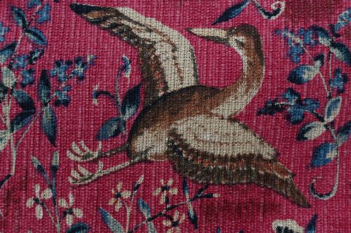 fig 1. A woven wall tapestry depicting a central female figure beside a tent inscribed Mon Seul Desir, surrounded by a lion, unicorn, and mille-fleurs background.