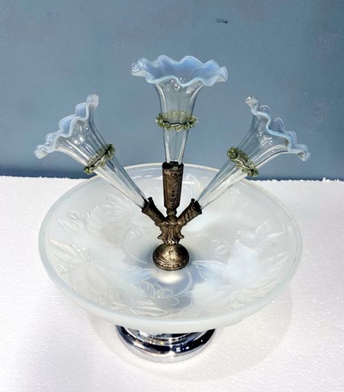 fig 3. An Art Deco opalescent glass epergne centrepiece featuring three trumpet-shaped glass vases mounted above a frosted glass bowl on a chrome base.