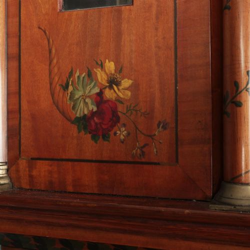 fig 2. An antique Scottish painted satinwood longcase clock with an arched moonphase dial, brass finials, and neoclassical floral painted panels.